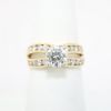 Picture of 14k Yellow Gold & Round Brilliant Cut Diamond Solitaire Ring with Split, Channel Set Diamond Band