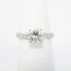 Picture of 14k White Gold & Round Brilliant Cut Diamond Solitaire Ring with Diamond Accented Twisting Band