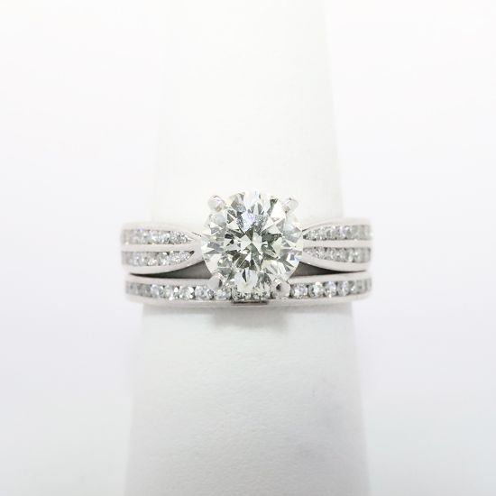 Picture of Platinum & Round Brilliant Cut Diamond Solitaire Bridal Ring Set with Channel Set Diamond Bands