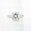 Picture of Platinum & Round Brilliant Cut Diamond Solitaire Ring with Baguette Cut Accents