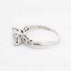 Picture of Platinum & Round Brilliant Cut Diamond Solitaire Ring with Baguette Cut Accents