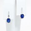 Picture of 14k White Gold & Oval Cut Sapphire Huggee Earrings with Diamond Accents