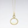 Picture of 14k Yellow Gold Necklace and Oval Opal Cabochon Pendant with Diamond Halo