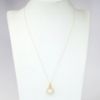 Picture of 14k Yellow Gold Necklace and Oval Opal Cabochon Pendant with Diamond Halo