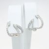 Picture of 14k White Gold & Diamond Snake Inspired Huggie Earrings