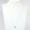 Picture of 14k Yellow Gold Necklace with Oval Cut Ruby Pendant with Diamond Accent