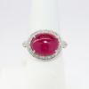 Picture of 18k White Gold & Oval Ruby Cabochon Ring with Diamond Halo