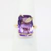 Picture of 14k Yellow Gold & Cushion Cut Amethyst Ring Wrapped in an Abstract Gold & Diamond Snake