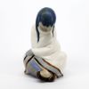 Picture of Lladro 'Eskimo Boy' & 'Eskimo Girl' Sleeping Gres Figurines #12007 & 12008