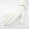 Picture of 14k Twisted, Baguette Cut Diamond Set White & Yellow Gold Bracelet