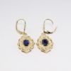 Picture of 14k Yellow Gold & Framed Oval Cut Blue Sapphire Earrings with Diamond Accents