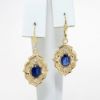 Picture of 14k Yellow Gold & Framed Oval Cut Blue Sapphire Earrings with Diamond Accents