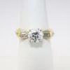 Picture of 18k Yellow Gold & Round Brilliant Cut Diamond Engagement Ring with Baguette  & Round Cut Accents