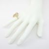 Picture of 14k Yellow Gold Waved Statement Ring with Round Brilliant Cut Diamond Accents