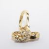 Picture of 14k Yellow Gold Waved Statement Ring with Round Brilliant Cut Diamond Accents