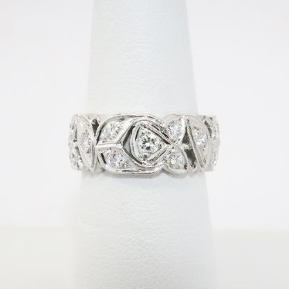 Picture of Pierced Platinum & Round Brilliant Cut Diamond Wedding Band with Milgrain Detailing