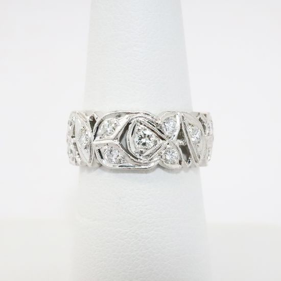 Picture of Pierced Platinum & Round Brilliant Cut Diamond Wedding Band with Milgrain Detailing