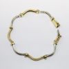 Picture of 18k Two-Tone Textured Gold & Diamond Arched Links Bracelet