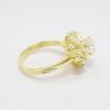 Picture of 18k Yellow Gold & Oval Cut Diamond Ring with Round & Baguette Cut Diamond Halo