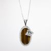 Picture of 14k White Gold Necklace with Oval Tiger's Eye Pendant Framed in Diamonds