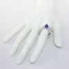 Picture of 14k White Gold & Trillion Cut Tanzanite Ring with Diamond Enhanced Band