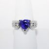 Picture of 14k White Gold & Trillion Cut Tanzanite Ring with Diamond Enhanced Band