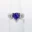 Picture of 14k White Gold & Trillion Cut Tanzanite Ring with Diamond Enhanced Band