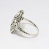 Picture of Late Edwardian Era 18k White Gold Filigree & Triple Old European Cut Diamond Ring