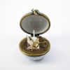 Picture of Limoges, France Porcelain Sphere Shaped Trinket Box with 'Surprise' Writing Utensils Inside