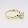 Picture of 14k Yellow Gold & Round Brilliant Cut Diamond Solitaire Engagement Ring with Undermounted Diamond Halo