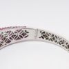 Picture of 18k White Gold & Pavé Set Pink Sapphire Hinged Bangle Bracelet with Inlaid Diamond Flowers by Roberto Coin