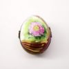 Picture of Retired Limoges Porcelain Egg Shaped Trinket Box with Wild Rose Motif by La Gloriette