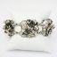 Picture of Vintage 1940's Hobé Sterling Silver Flowers & Ribbons Bracelet