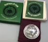 Picture of Lunt 1977 Sterling Silver "Holly Wreath" Ornament, gently used, with box