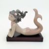 Picture of Lladro ,Set Of 3 Mermaids With Wooden Stands. 1413 (Illusion), 1414 (Fantasy), & 1415 (Mirage)