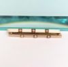 Picture of Edwardian Era Pair Of 14K Yellow Gold, Seed Pearl & White Enamel Bar Brooches