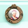 Picture of Art Nouveau Era Hand Painted Porcelain Cameo Brooch With Water Lily Decoration