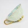 Picture of Vintage Shelley English Bone China 'Melody' Chintz Tea Cup & Saucer in Oleander Shape with Green Exterior