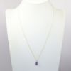 Picture of 14k Yellow Gold Tanzanite & Diamond Necklace 