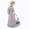 Picture of 'Pulling dolls Carriage' Porcelain Figurine #5044 by Lladro 