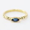 Picture of 14k Yellow Gold Curved Oval Blue Sapphire Ring