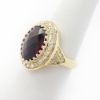 Picture of 14k Yellow Gold Oval Garnet & Diamond Halo Ring
