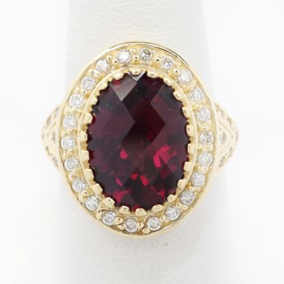 Picture of 14k Yellow Gold Oval Garnet & Diamond Halo Ring