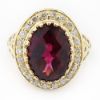 Picture of 14k Yellow Gold Oval Garnet & Diamond Halo Ring